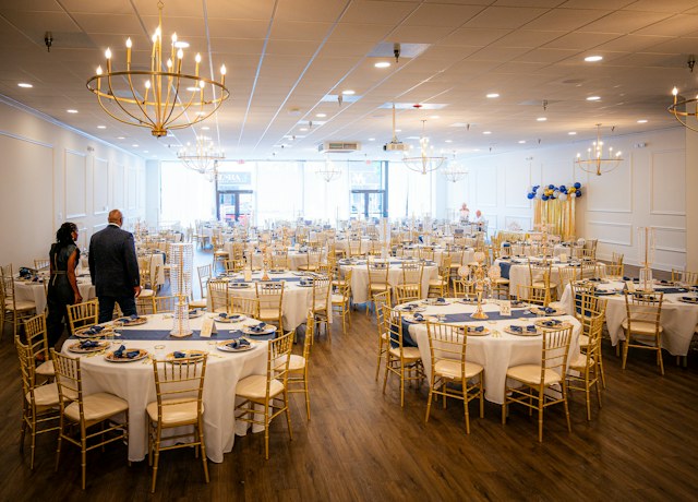 Banquet hall set with round tables for an event