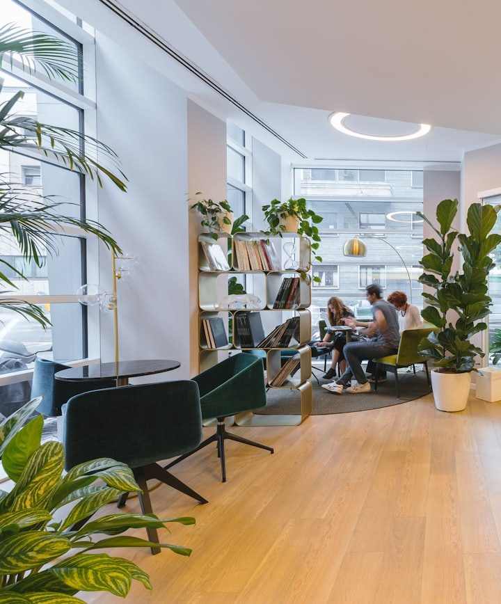 A reception area with seating and a front desk